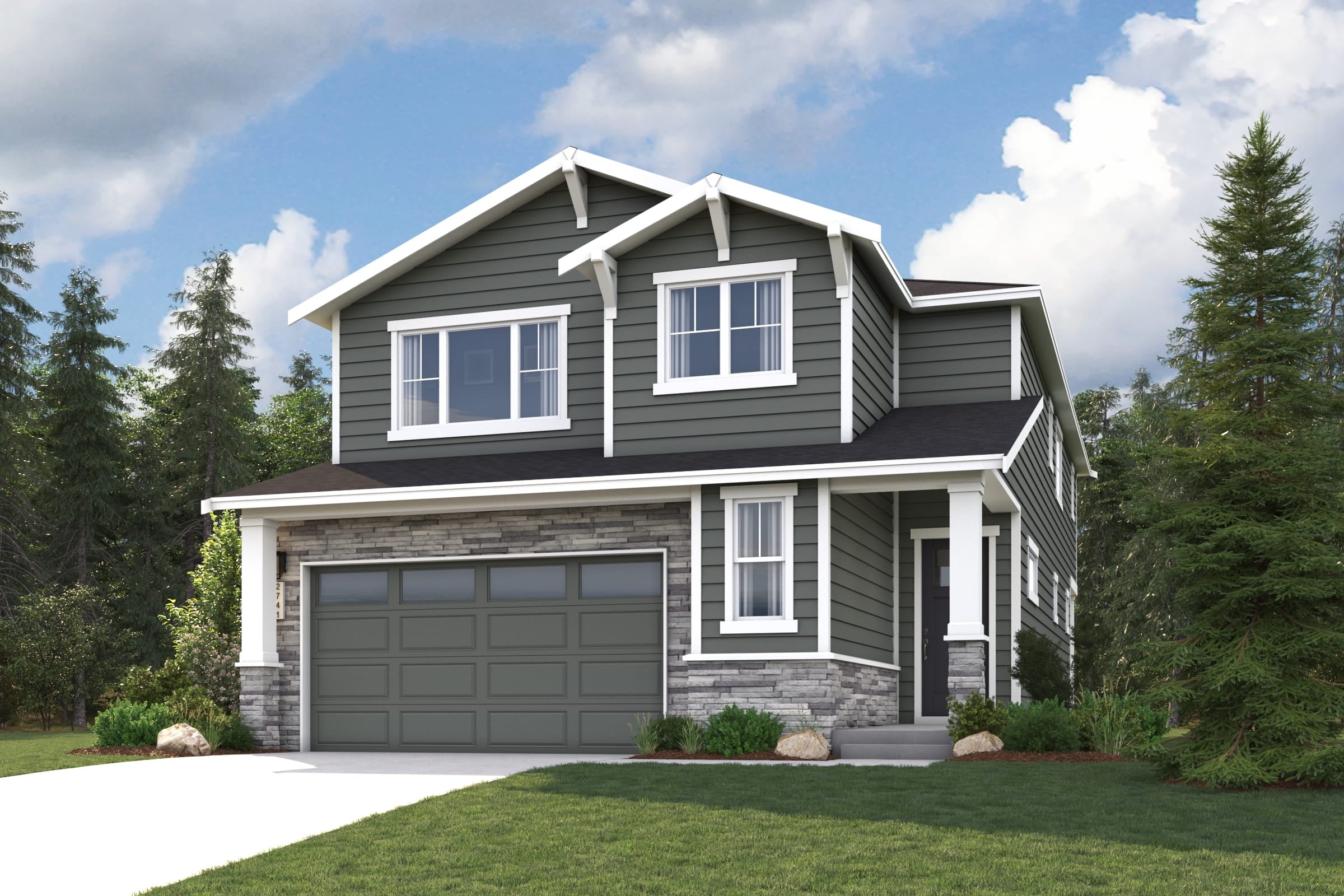 A house with a garage and trees.