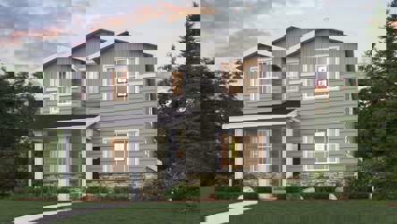 A house with a lawn and trees.