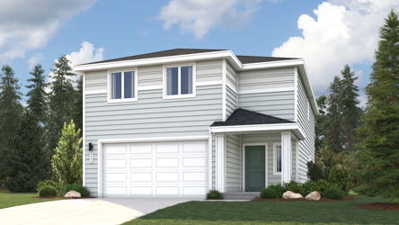 A white house with a garage.