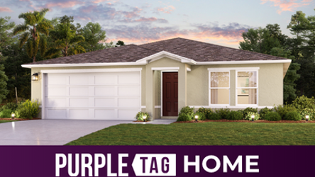 A house with a lawn and trees.