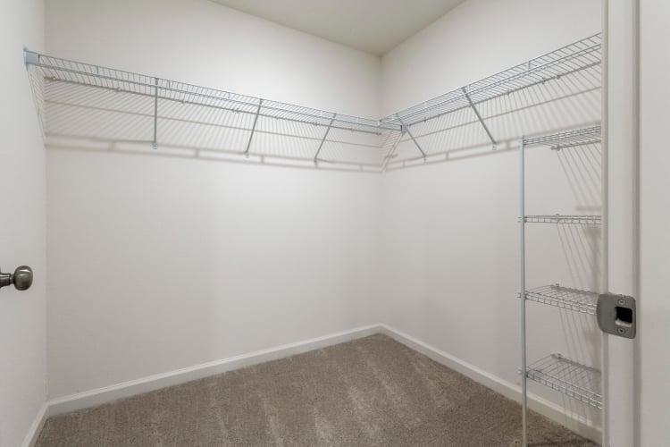 A room with a ladder and a metal ladder.