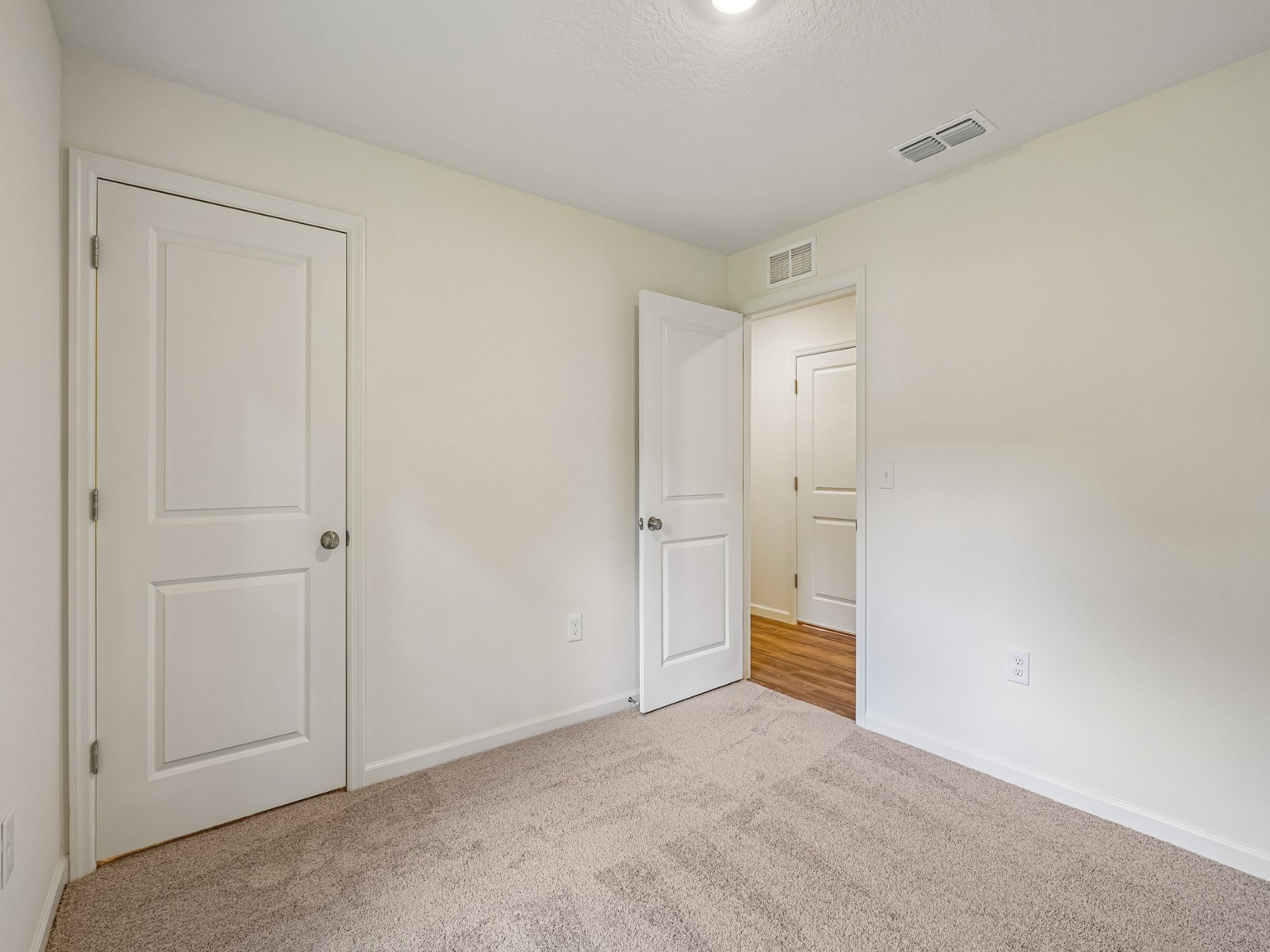 A room with white doors.