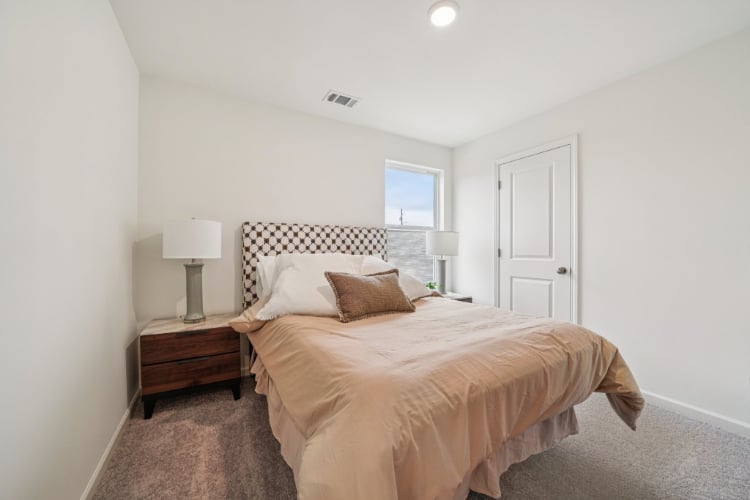 A bed in a bedroom.
