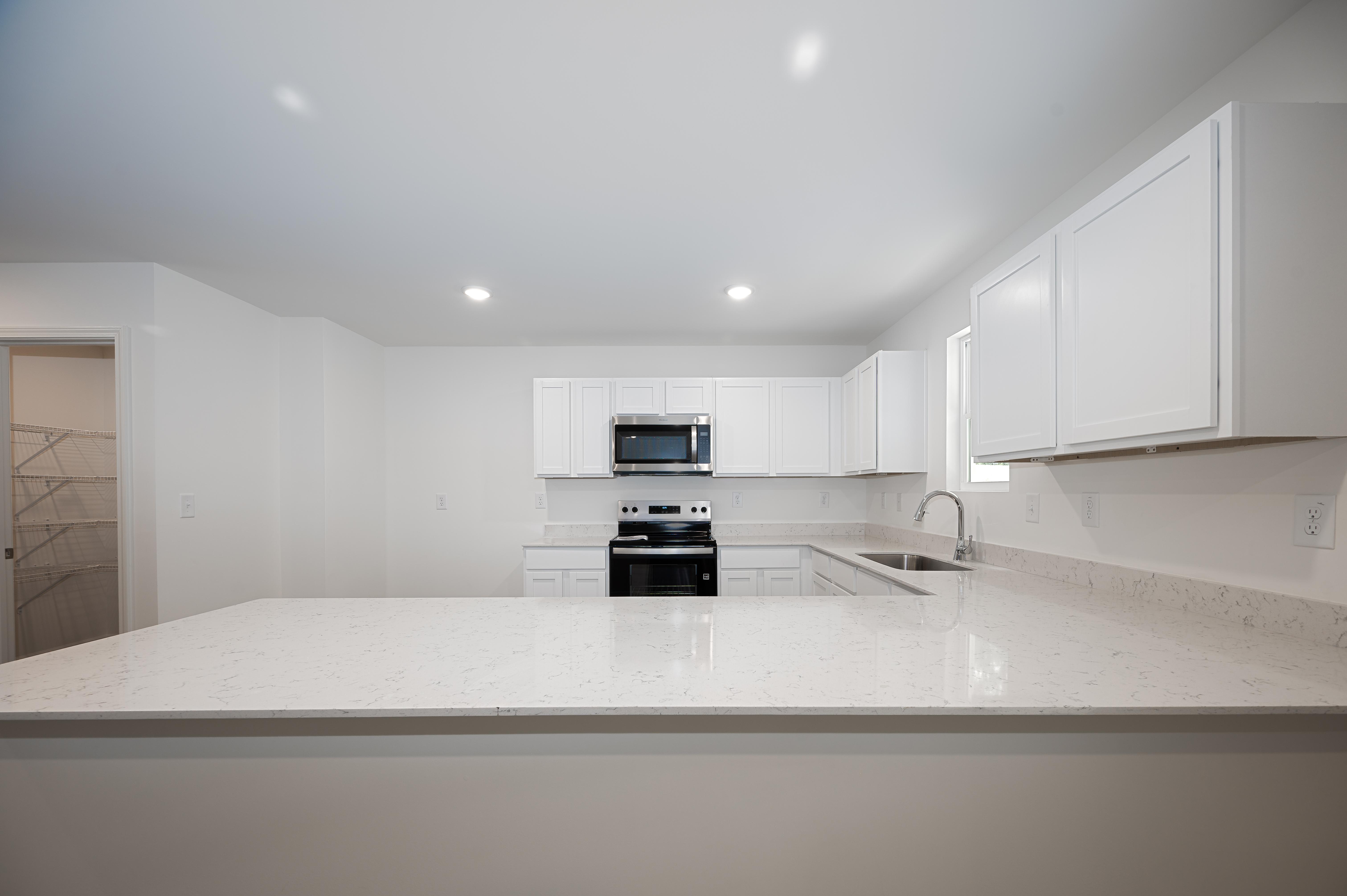 kitchen 3 - augusta - unfurnished + quartz - se arrowhead by the lake