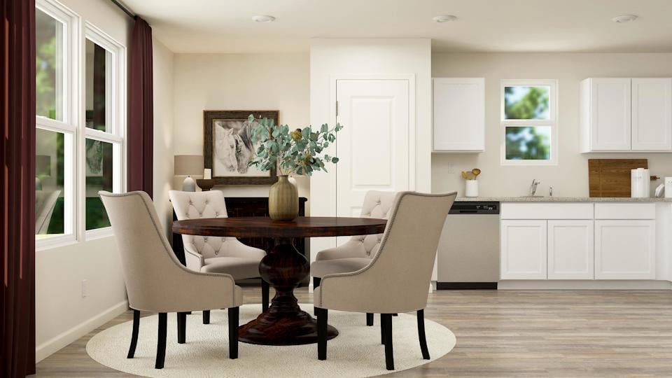 A dining room table and chairs.