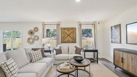 A living room with a large window.