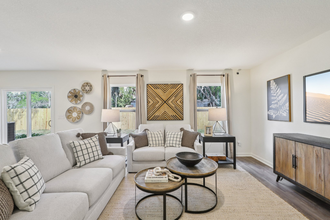 A living room with a couch and a coffee table.