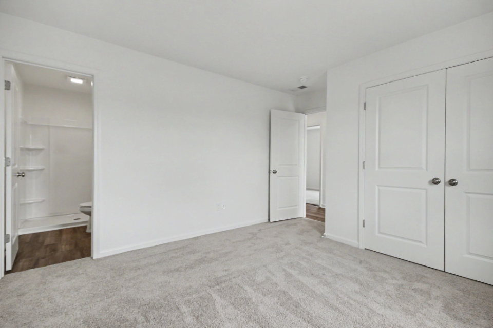 A room with white doors.