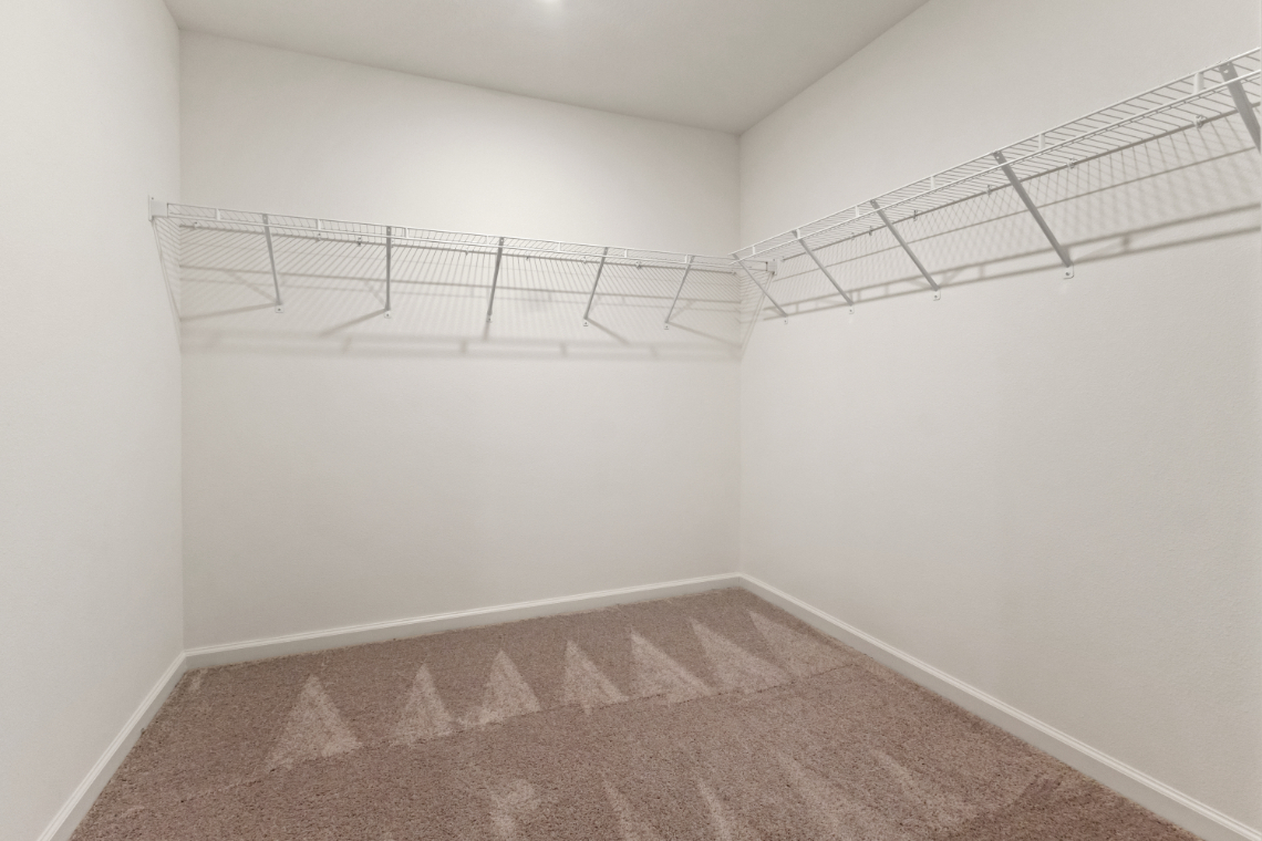 A room with a metal railing.