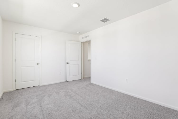 A room with white doors.