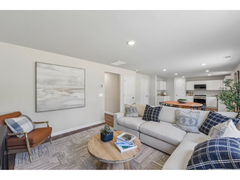 A living room with a couch and a coffee table.