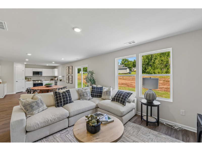 A living room with a large window.