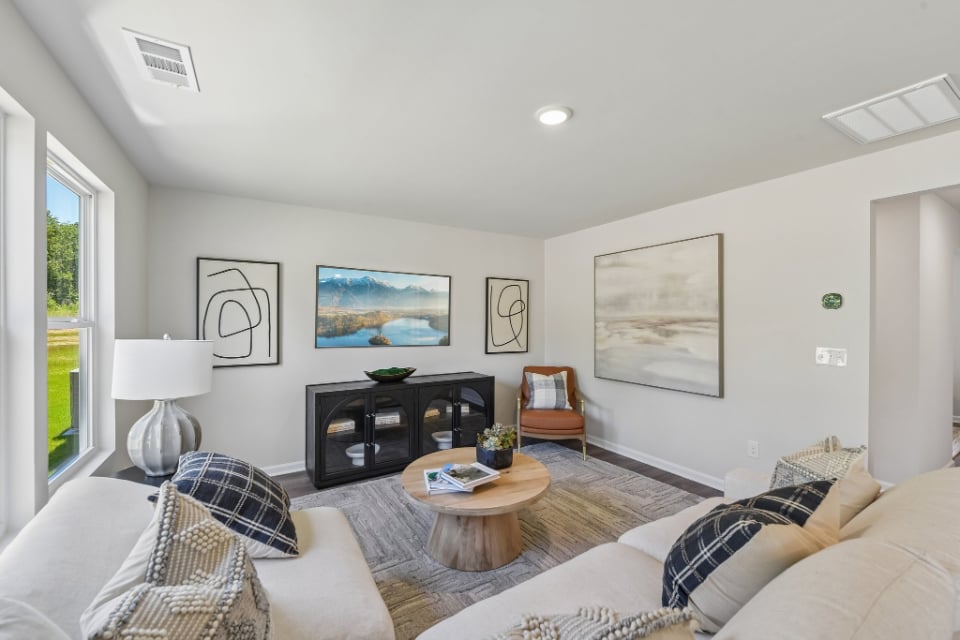 A living room with a couch and a coffee table.