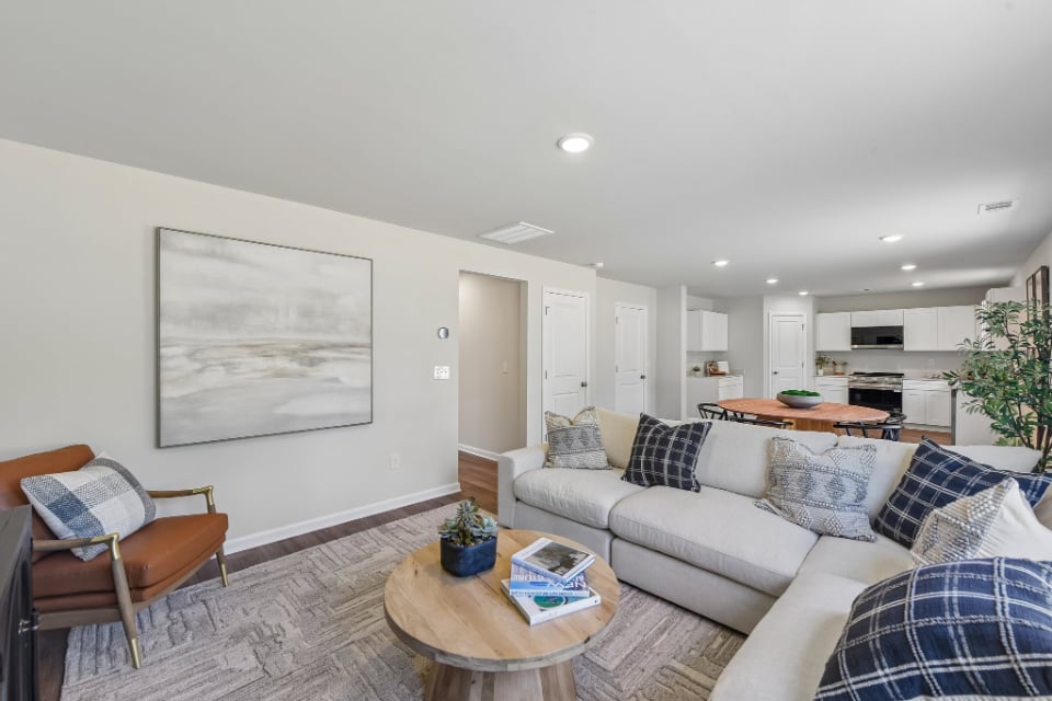 A living room with a couch and a coffee table.