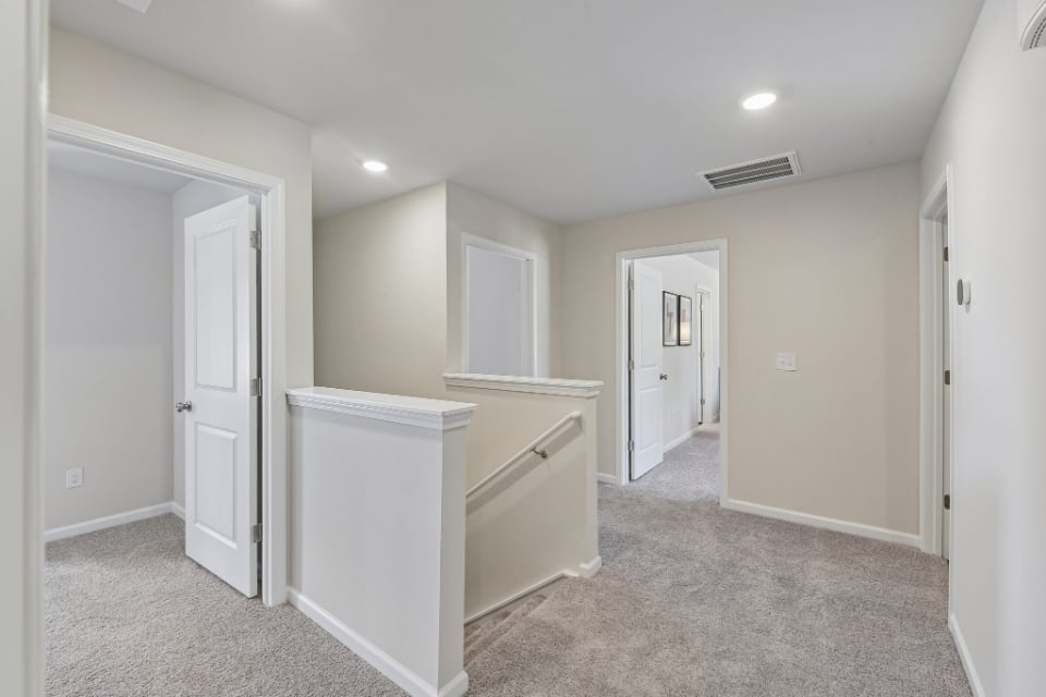 A room with white cabinets.