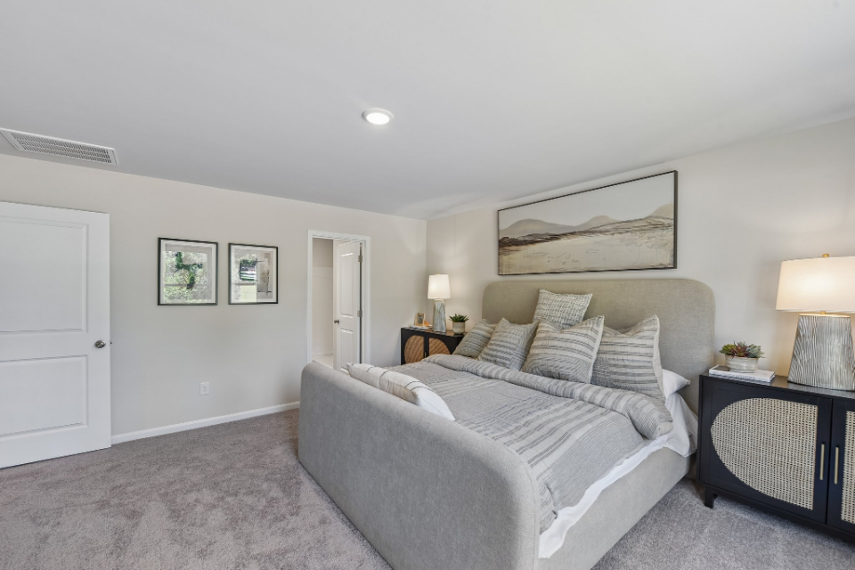 A bed in a room.