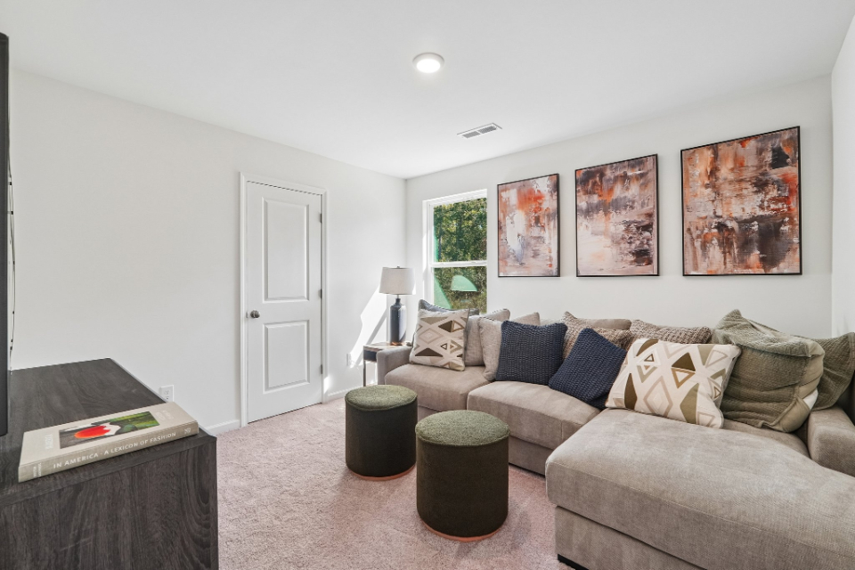 A living room with a couch and a coffee table.