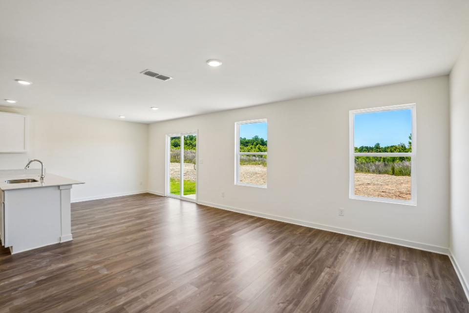 A room with a wood floor and a wood floor with a wood floor.