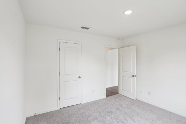 A room with white doors.