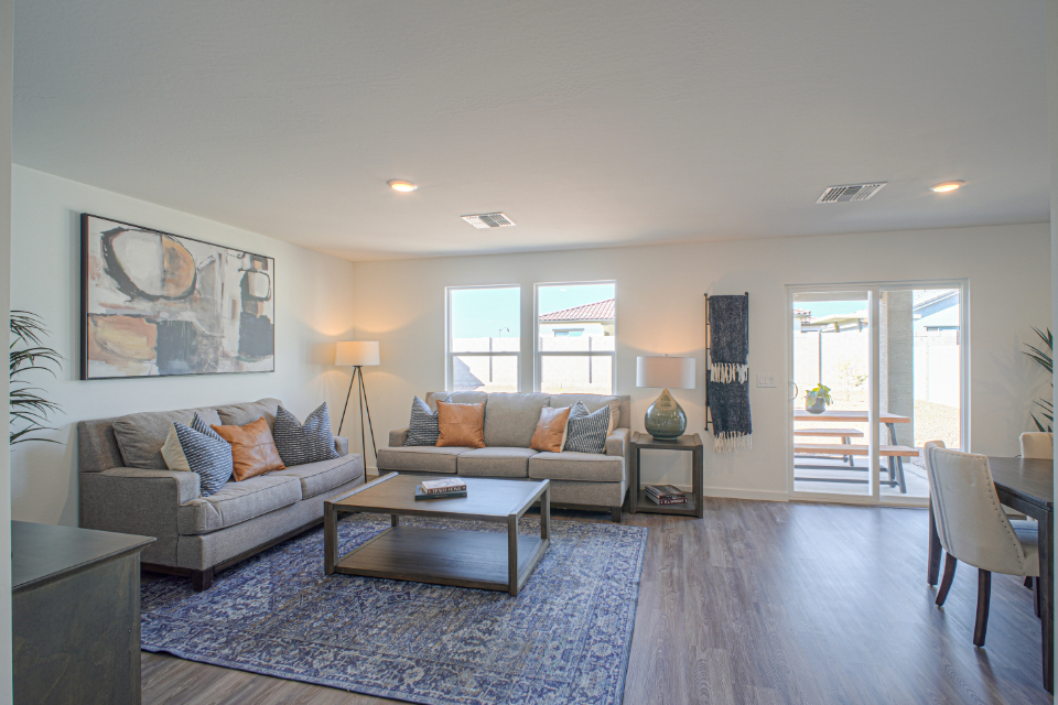 A living room with a large window.