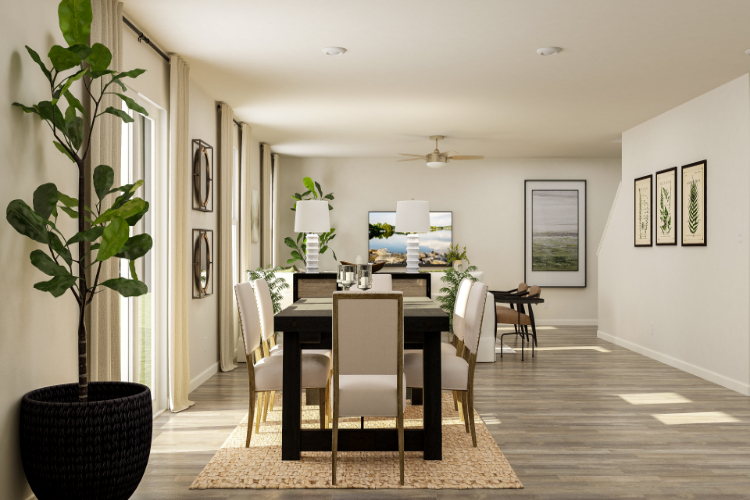 A dining room with a table and chairs.