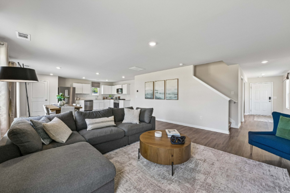 A living room with a couch and a coffee table.