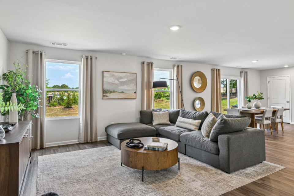 A living room with a couch and coffee table.