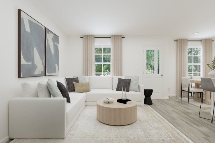 A living room with a white couch.