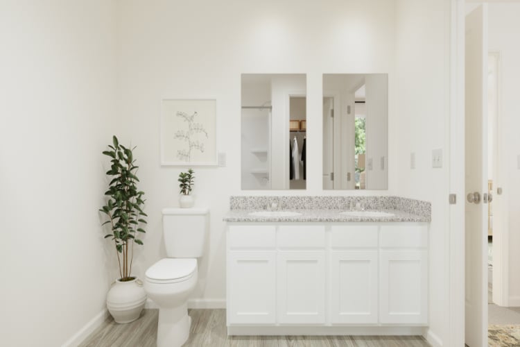 A bathroom with a marble countertop.