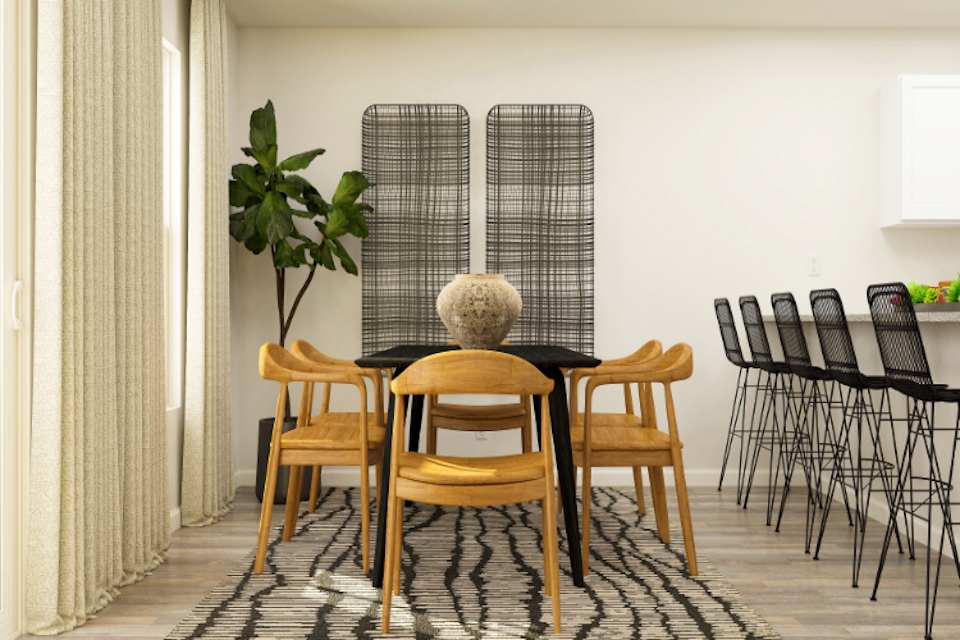 A table with chairs around it.