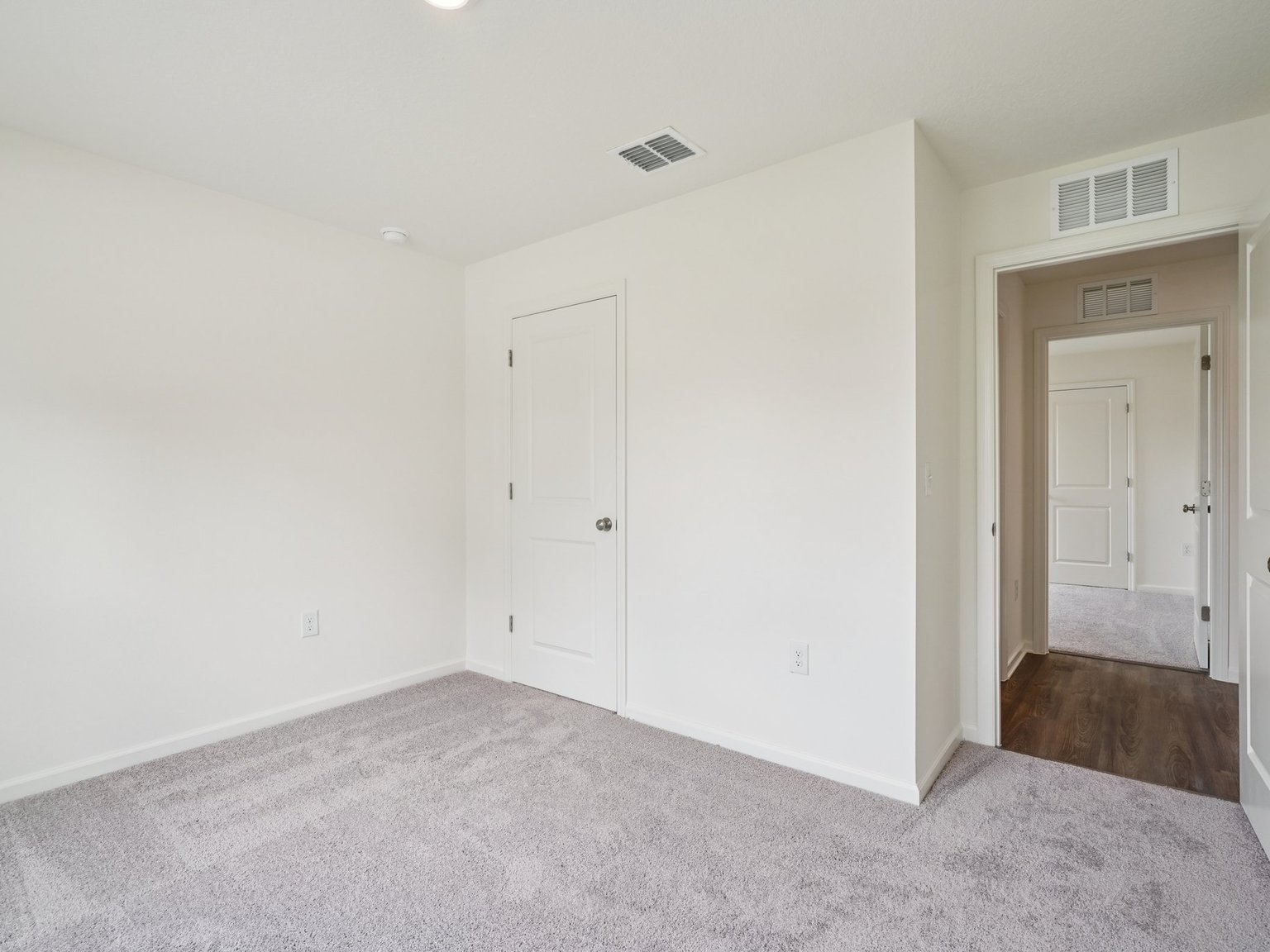 A room with white doors.