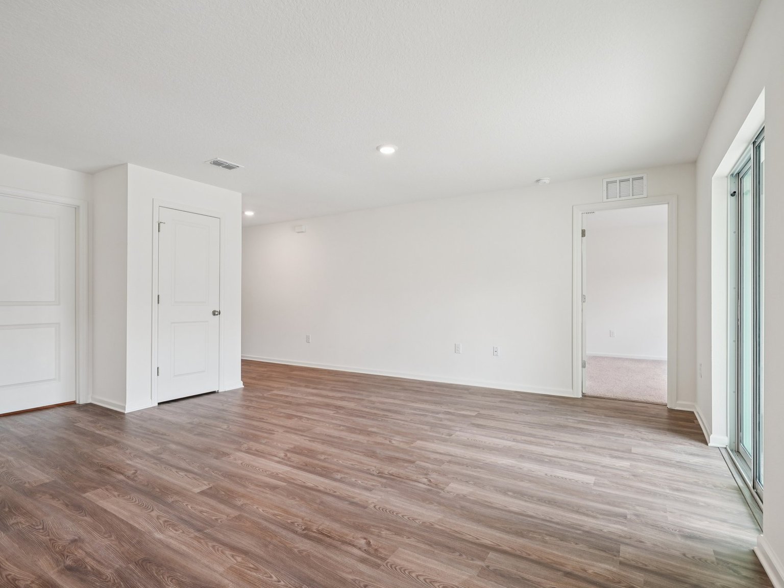 A room with white doors.