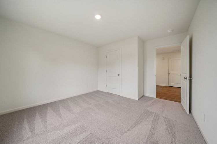 A room with white doors.