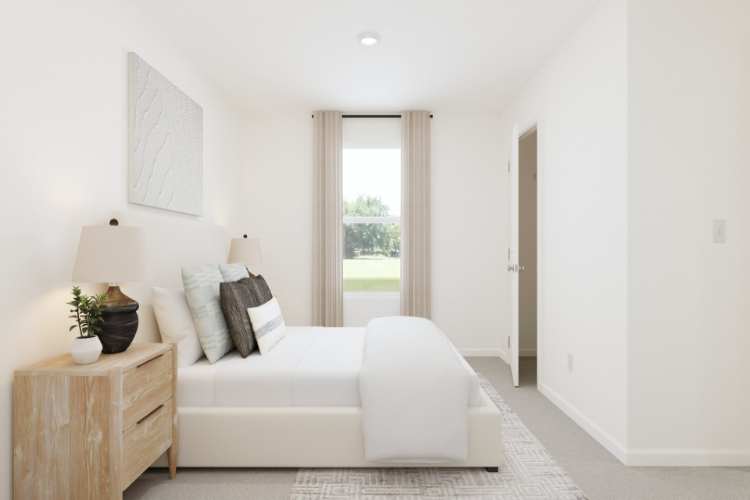A living room with a white couch.