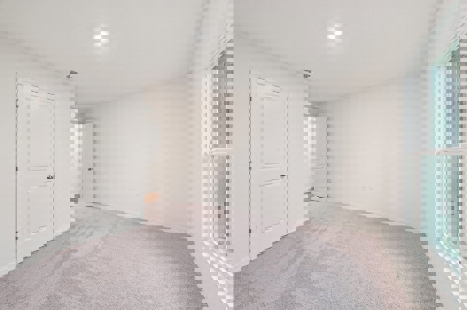 A room with white doors.