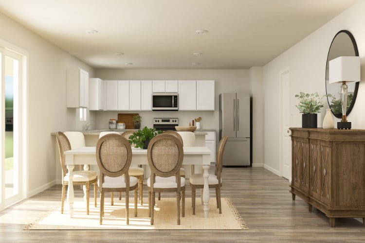 A kitchen with a dining table and chairs.