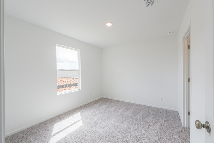 A hallway with a window.