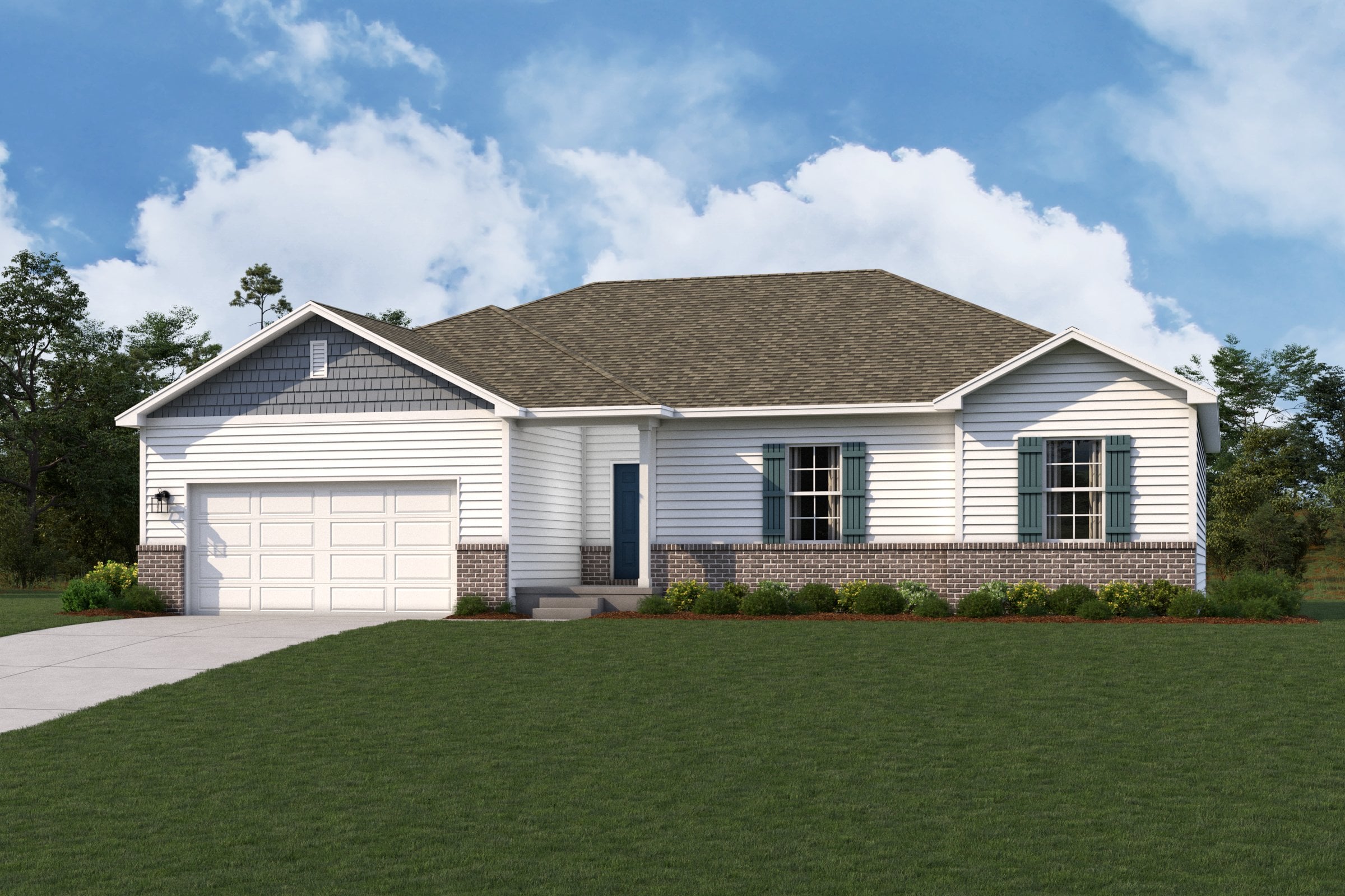 A house with a lawn in front of it.