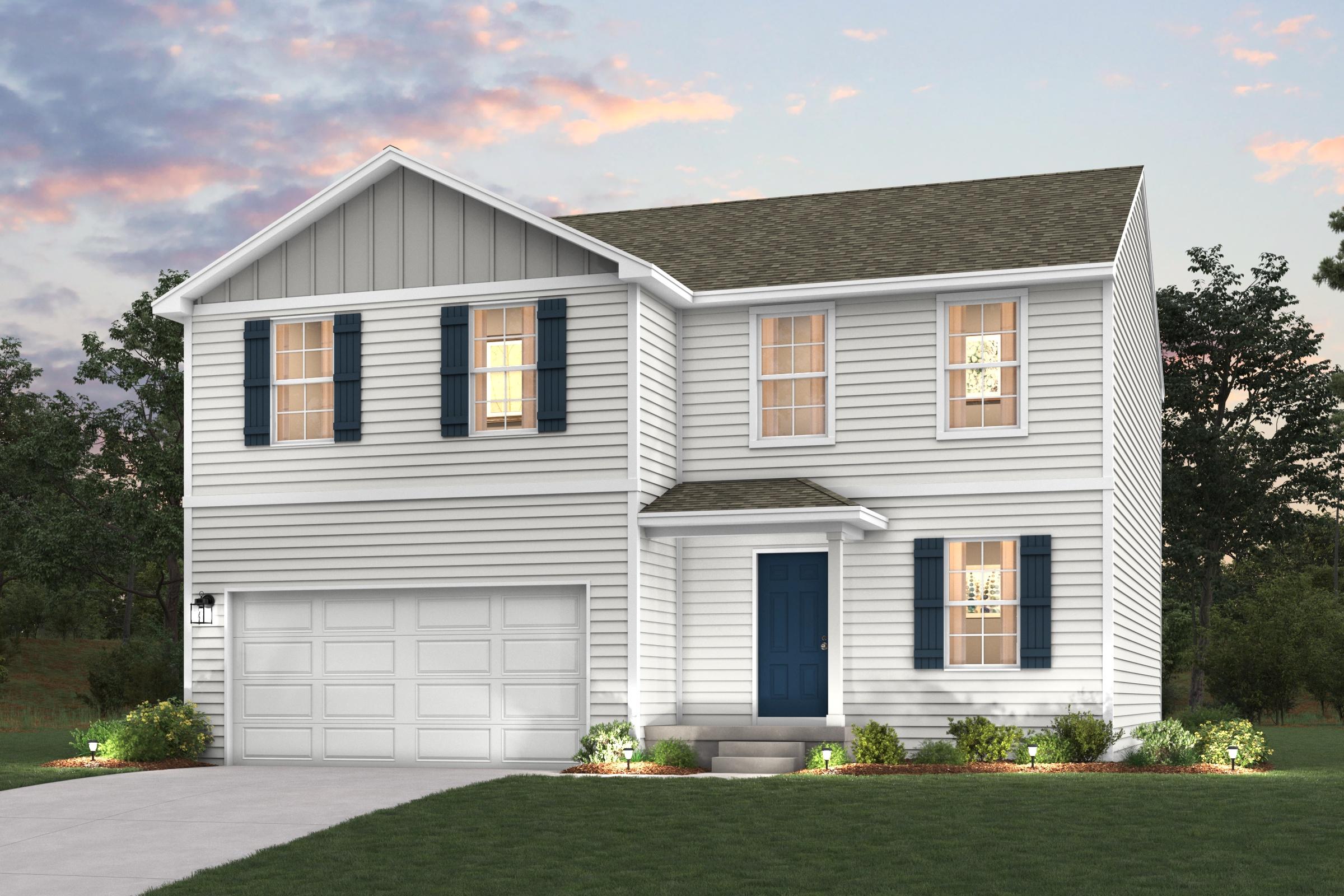 A white house with a garage.
