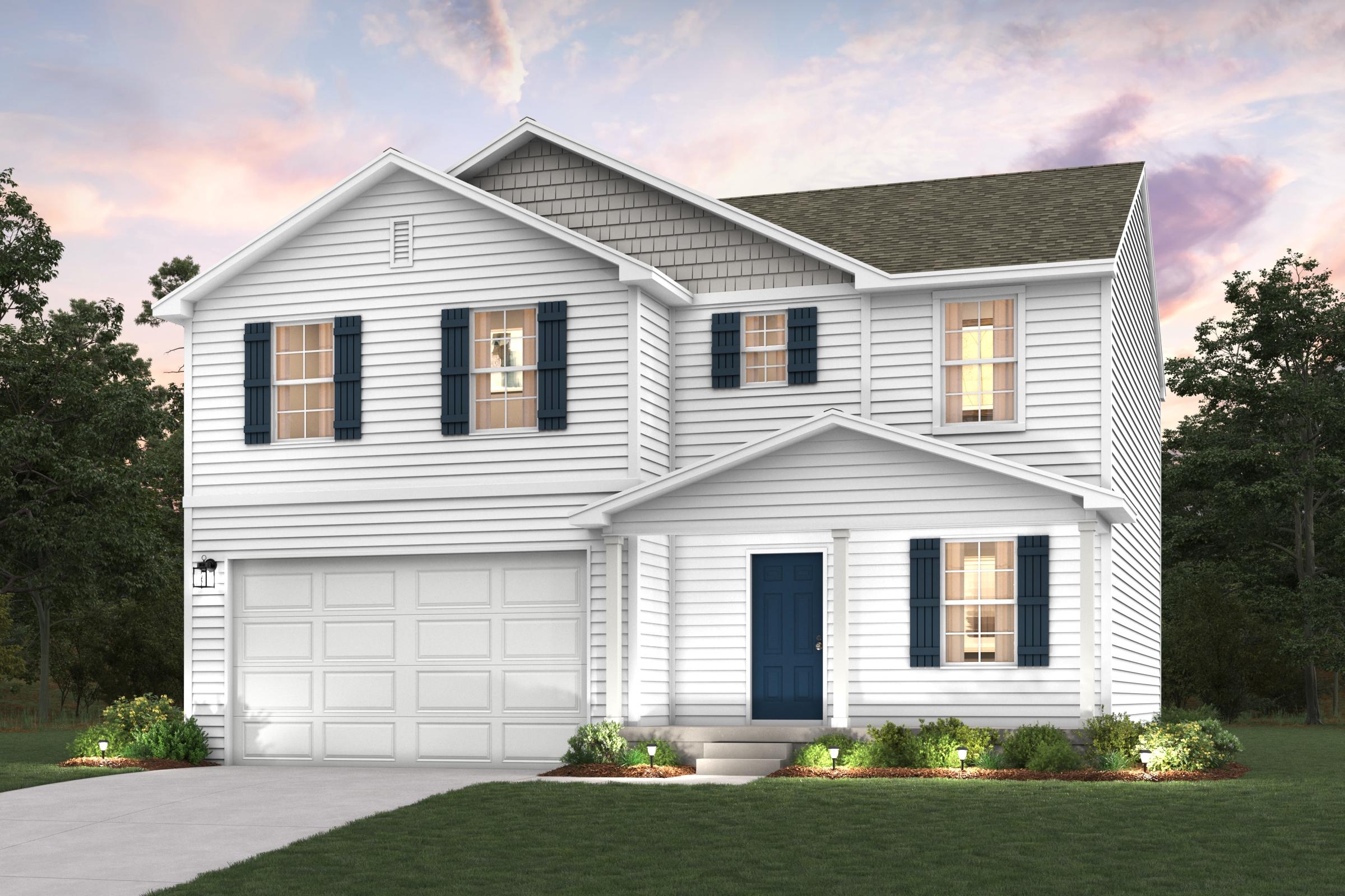 A white house with a garage.