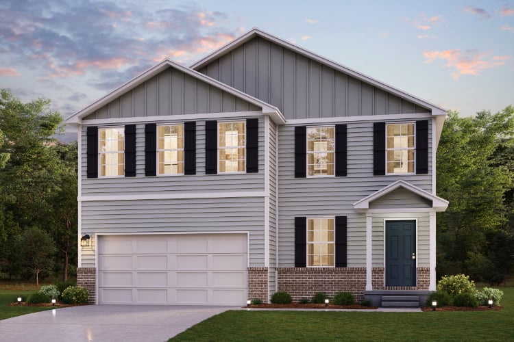 A white house with black shutters.