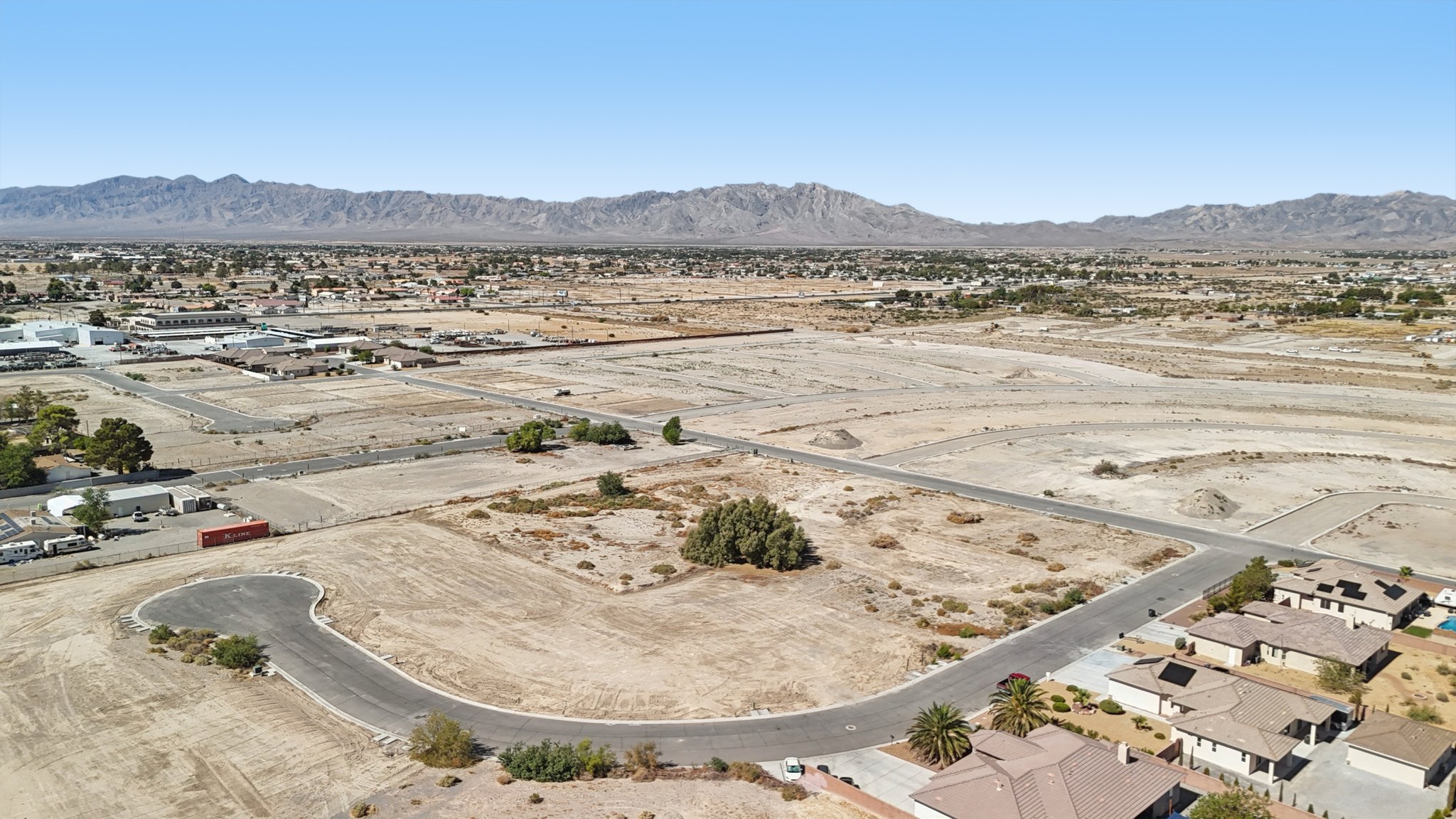 A large area with buildings and trees.