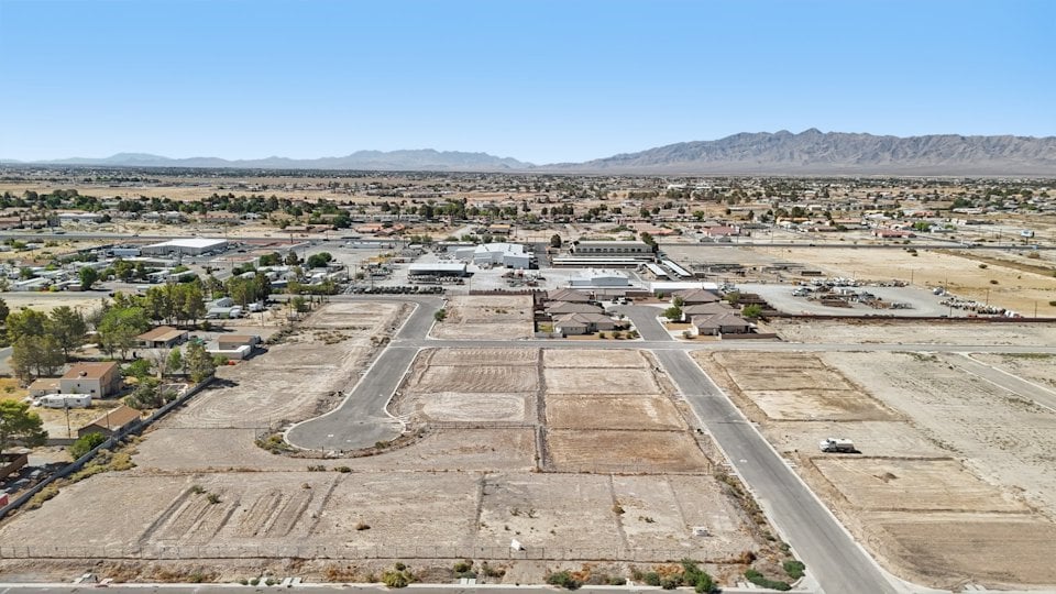 A large area with buildings and trees.