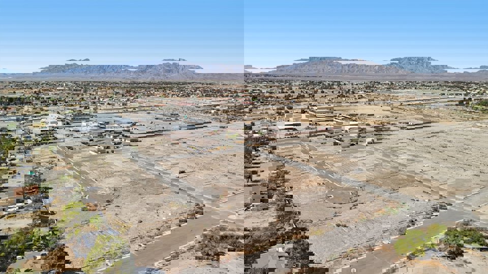 A large area with many buildings and trees.