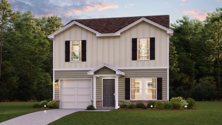 A house with a lawn and trees.