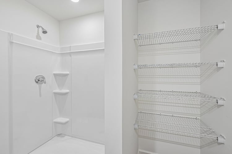 A bathroom with a toilet and sink.