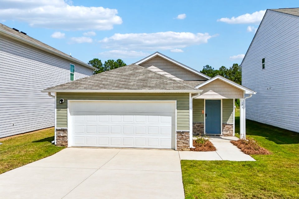 A garage and a house.