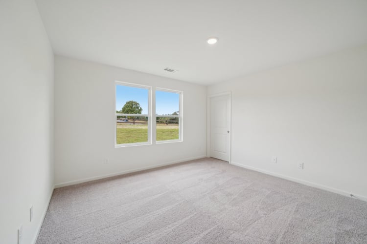 A room with a large window.