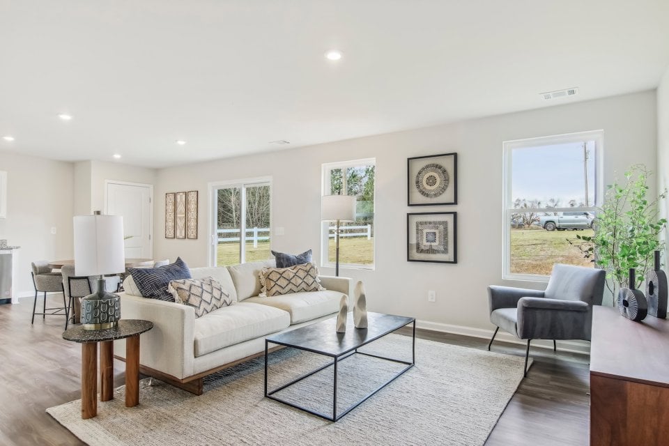 A living room with a large window.