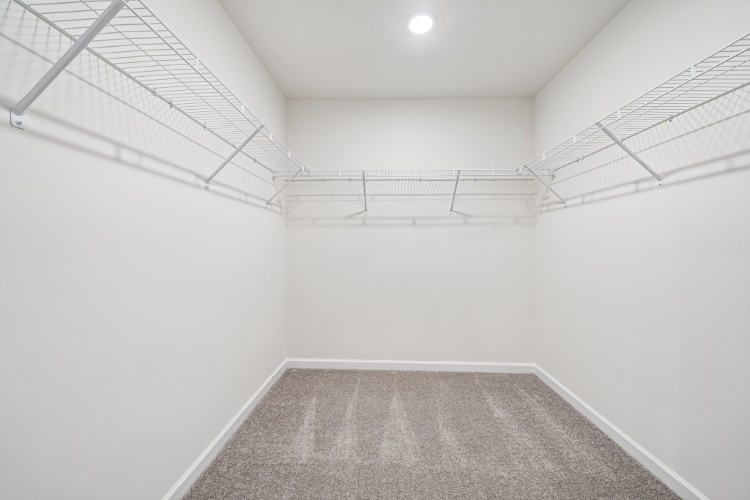 A white hallway with a light.
